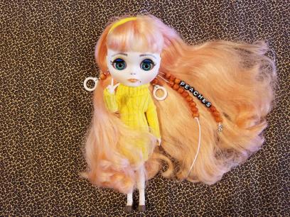 Blythe Doll Peaches in a Yellow Sweater Dress